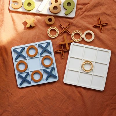 MOQ 50 مجموعه سیلیکون XO Tic Tac Toe پازل لوگو سفارشی رنگ BPA رایگان گواهینامه CE اسباب بازی های سیلیکونی